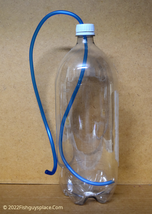 Bottle with cap holes